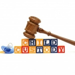 A gavel and bricks with CHILD CUSTODY words