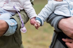 Parents holding babies, child custody lawyer