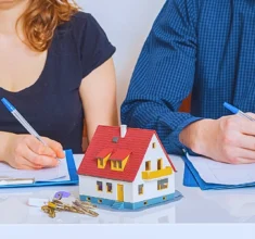 Man and woman are signing divorce agreement. Dividing Stock Options & RSUs