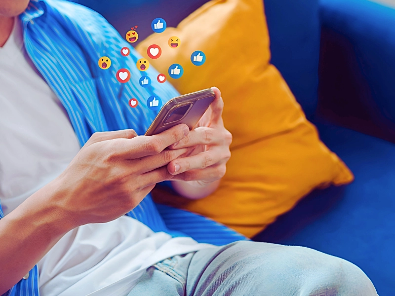 A man using his phone cheking his social media post.